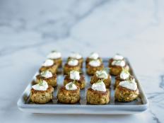 It is always good to have an easy, budget-friendly appetizer in your recipe collection when you are entertaining. Here, Ree transforms simple canned salmon into a platter of delicious salmon cakes.