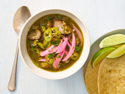 NEW MEXICO–STYLE CHILI VERDE. Served with pickled red onion, pickled jalapeños, tortillas and lime wedges.