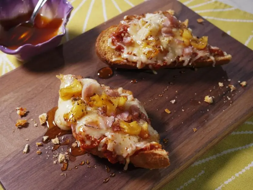 Sunny Anderson's Sunny’s French Bread Hawaiian Pizza Beauty, as seen on The Kitchen, Season 36.