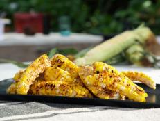 For me eating grilled barbecue-basted corn &ldquo;ribs&rdquo; is more fun than just eating corn on the cob, and for kids the quartered cobs are easier to eat. I also love that the cob really does look like a rib bone to kids. I slather the ribs with a homemade barbecue sauce, but you can also just use your favorite store-bought sauce.