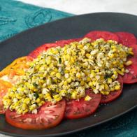Chile Lime Creamed Corn with Garden Tomatoes, as seen on Food Network's Symon's Dinners Cooking Out, Season 5.