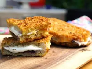 Crispy Grilled Cheese Sandwich with Fresh Mozzarella, Mushrooms, and Blueberry Jam, as seen on Food Network's Symon's Dinners Cooking Out, Season 5.
