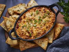 Baked Chipotle Jalape&ntilde;o Popper Dip is a must-try at your next pub night, with a crunchy toasted topping, served up with fried pita chips!