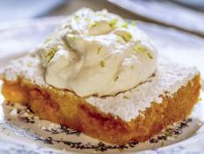 Ree likes to serve her pineapple bars in the springtime. They are based on her recipe for lemon bars, but swapping in the more tropical pineapple and lime gives her a foretaste of the warmer weather ahead in the coming months.