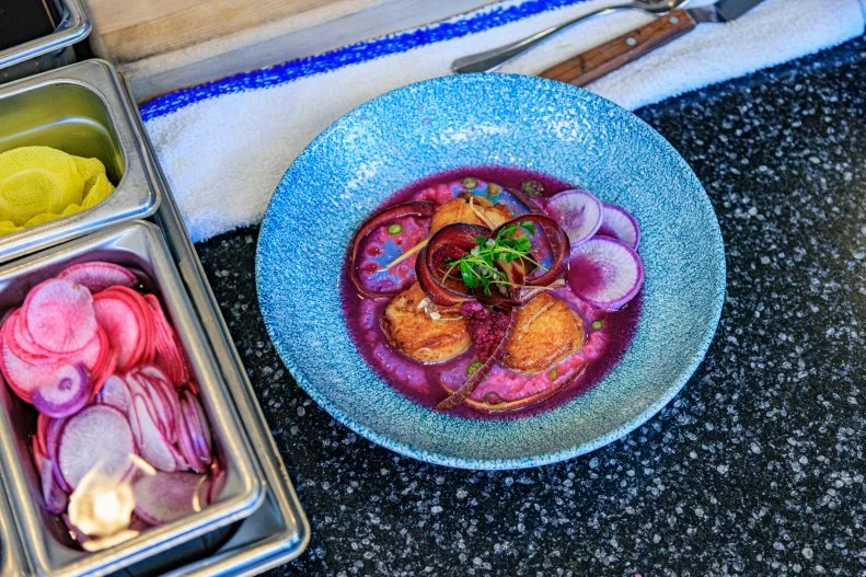 Host Selena Gomez and Chef Chef Marcel Vigneron's Dish "Scallops with Purple Cauliflower Puree", as seen on Selena + Restaurant, Season 1.