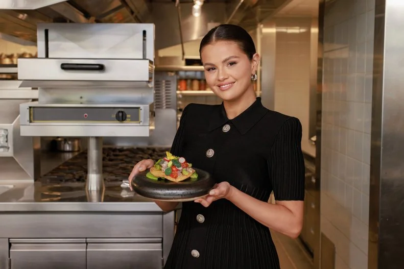 Host Selena Gomez with her dish "Selena Ceviche", as seen on Selena + Restaurant, Season 1.