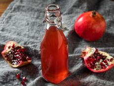 Homemade Sweet Red Pomegranate Grenadine Syrup in a Bottle