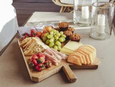 A breakfast-for-dinner board can be anything you might want to eat for a special breakfast but all arranged beautifully on a round or rectangular board. This list is mostly things that you can buy from a bakery and grocery store and assemble. Everyone will love having a buffet of delicious treats to choose from!