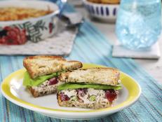 This is a delicious and fresh take on a chicken salad. Roasting the grapes adds an extra burst of concentrated sweetness, and combined with the subtle licorice flavor from fresh tarragon, it&rsquo;s a perfect pairing. Toasted pecans add the perfect nutty crunch to round out this chicken salad, making it great for company, or to keep in the fridge all week long. It only gets better!