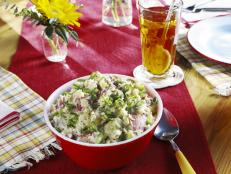 My classic Southern potato salad gets its tang from apple cider vinegar and Creole mustard. More of a mashed potato salad, it gets better the longer it sits!