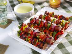 This is a surprisingly simple dish for your next grill out. My kielbasa skewers are a crowd favorite &mdash; what&rsquo;s more fun than food on a stick? The charred sausage and vegetables are served alongside a flavorful mustard dipping sauce for the perfect pairing.