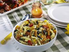 This is a crowd-favorite and one that you can find me eating all summer long. It's great as-is, or you can substitute any of your favorite pasta shapes, vegetables or mix-ins. It&rsquo;s tossed together with my easy Italian dressing. The longer the flavors can marinade together, the better!