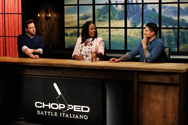 Judges Scott Conant, Tiffany Derry and Gabe Bertaccini deliberate following round three, as seen on Chopped: Battle Italiano, Season 58.