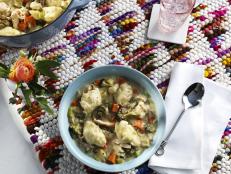 There is nothing more comforting than a big bowl of chicken and dumplings. Mine is loaded with roasted vegetables and juicy shredded chicken thighs. Using frozen biscuits is a timesaving hack that results in the perfect pillowy dumplings, every time. This is creamy and full of home-cooked flavor!