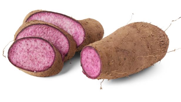 sliced purple yam isolated on white background, dioscorea alata, aka ube, violet yam, water or greater yam, purple-fleshed tubers used in cuisine and traditional medicine