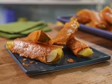 There&rsquo;s a clique of pickle lovers out there, and I would like to humbly submit this recipe to them for consideration. It&rsquo;s a fun way to get a little bit more texture than the crunch from the pickle skin, and another way to add flavor. You can also add some chile-lime seasoning or steak seasoning to the jar of pickles and let them cold soak for a few days before making this to intensify the flavors.