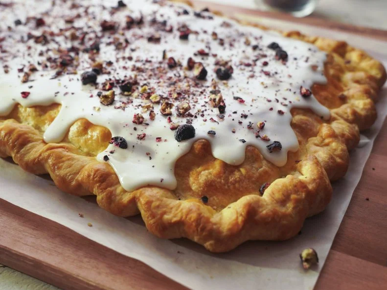Beauty shot of Molly Yeh's Blueberry Speculoos Slab Pie as seen in Girl Meets Farm Season 15