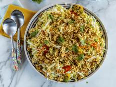 This is the perfect salad to take to a potluck or a party. Based on a recipe by her husband Ladd&rsquo;s grandmother, it is colorful, crunchy and fresh. The ramen noodle topping makes this dish the star of any buffet table.