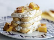 Icebox pies are the perfect dessert for entertaining. They are make-ahead, look stunning and there are never any leftovers. This pie is made extra special with grilled pineapple scattered over the top.