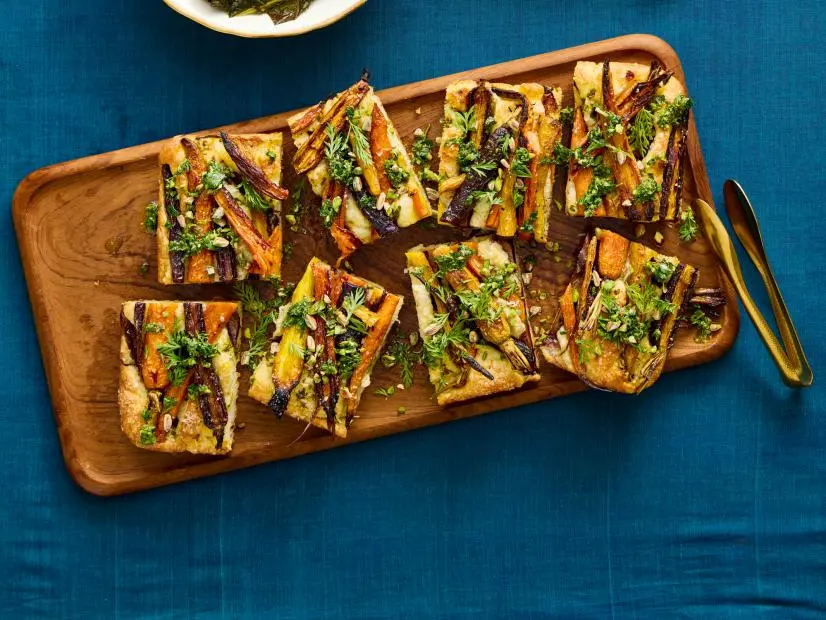Cider-Braised Collard Greens, Creamed Cabbage, and Rainbow Carrot Focaccia.
