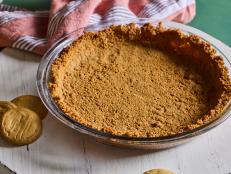 Easy to prepare and full of festive flair, this gingersnap crust is the perfect foundation for your next holiday dessert masterpiece. This crust brings a burst of warm, spiced flavor that perfectly complements a variety of fillings. Its crunchy, aromatic profile pairs beautifully with creamy pumpkin pie, rich chocolate silk pie and tangy lemon meringue pie!