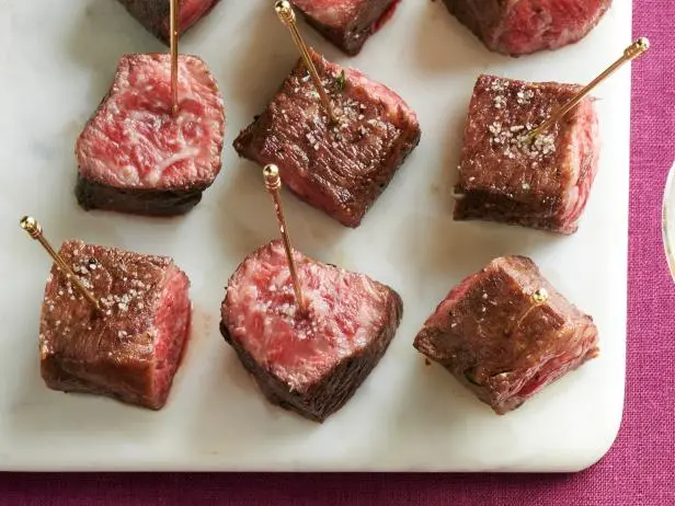 https://food.fnr.sndimg.com/content/dam/images/food/fullset/2024/11/26/FNM120124_steak-bites-with-truffle-salt_s4x3.jpg.rend.hgtvcom.616.462.suffix/1732635586344.webp