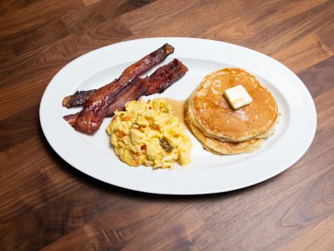 Cheesy Spicy Scrambled Eggs with Buttermilk Vanilla Pancakes and Candied Bacon