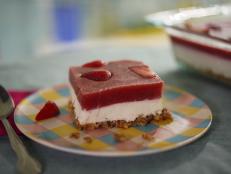 This is a classic dish with a few updates. When I was growing up, my mom would use pre-sweetened gelatin, and there were no fresh strawberries. I decided to put a bit more effort into it so I wouldn&rsquo;t feel guilty, but you can use store-bought strawberry gelatin packets. Simply make it according to the box.