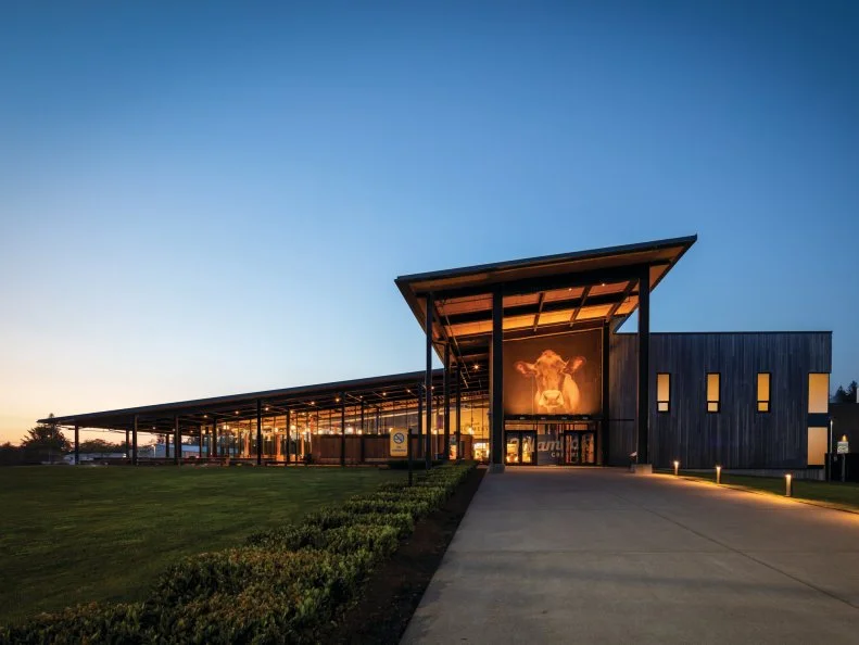 Tillamook Creamery exterior at dusk.