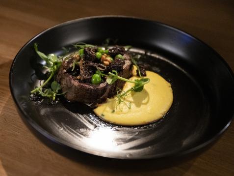 Roasted Filet with Fresh Corn Polenta, Morels, Peas, Currants and Pine Nuts