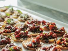 These toppings work well on any kind of bread or cracker as a party appetizer and are very quick to make. Both toppings have a mix of sweet and salty elements and are bound to delight your guests.