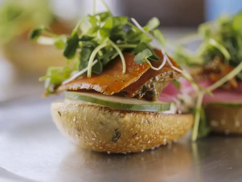 Carrot Lox Bagel as prepared by Chef Tempra Arroyo at Humble Wood Fire Bagel in Gainesville, Florida as seen on Food Network's Diners Drive-Ins and Dives, Season 41.