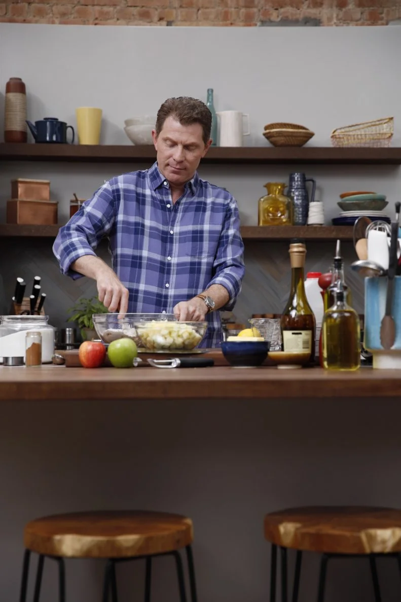 Chef Bobby Flay prepares a dish, as seen on Food Network's Brunch @ Bobby's, Season 7.