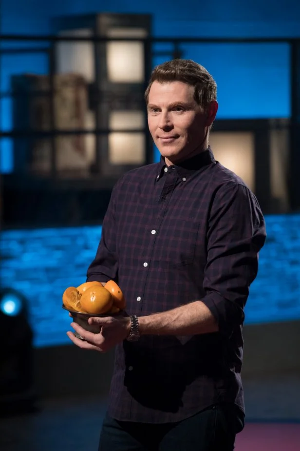 Chef Bobby Flay introduces persimmons as the round one challenge ingredient, as seen on Food Network's Beat Bobby Flay, Season 12.