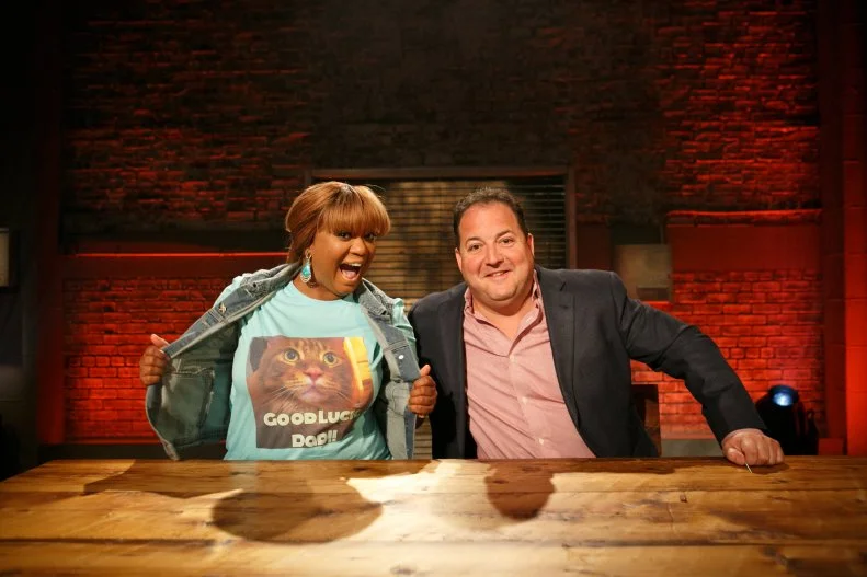 Co-Hosts Sunny Anderson and Josh Capon pose for the camera for Round 1, as seen on Beat Bobby Flay, Season 15.