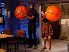 Co-hosts Amar'e Stoudemire and Katie Lee enter Kitchen Stadium, as seen on Beat Bobby Flay, Season 30.