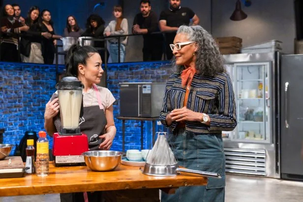 Co-host Carla Hall checks in with contender Shirley Chung during Round 1, as seen on Beat Bobby Flay, Season 36.
