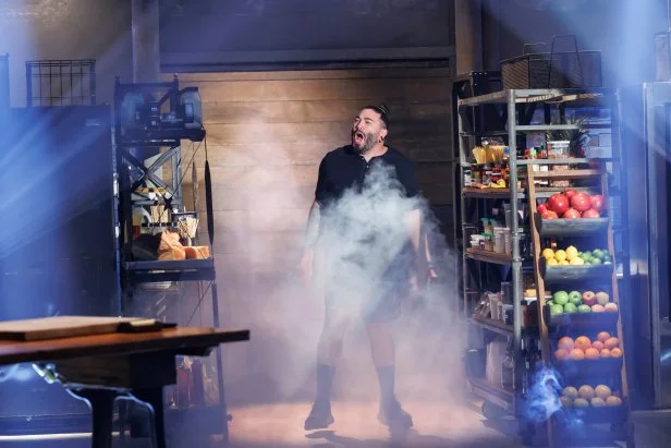 Chef Logan Sandoval enters Kitchen Stadium with an excited roar.