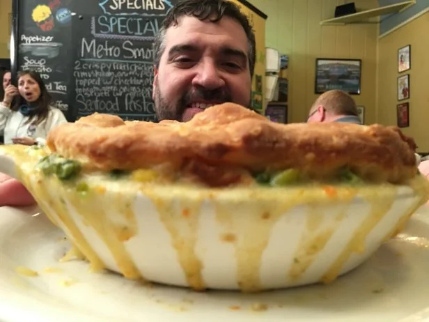 Chef Mark Davoli posing with the chicken pot pie from Metro Diner