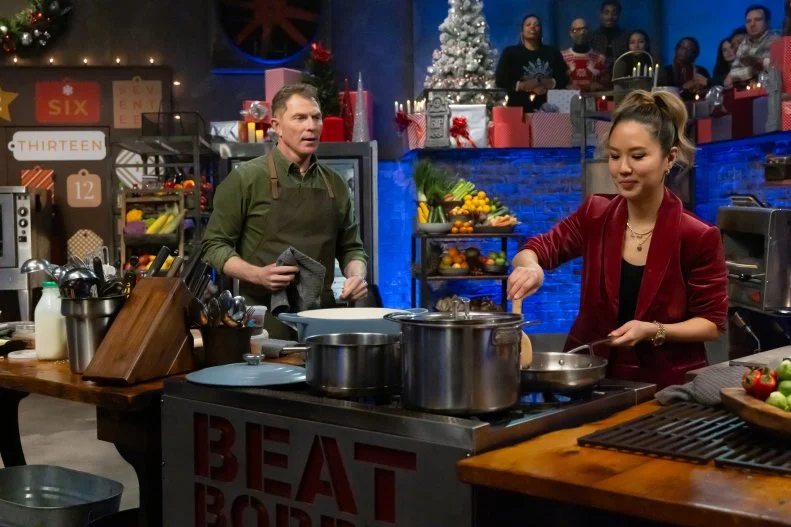 Host Bobby Flay and Contender Esther Choi prepare signature dish, as seen on Beat Bobby Flay, Hoiliday Throwdown Season 4