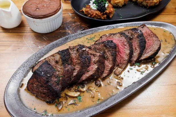 Contenders Brooke Williamson and Claudette Zepeda's Roasted Chateaubriand with Marsala Sauce, as seen on Beat Bobby Flay Holiday Throwdown, Season 4.