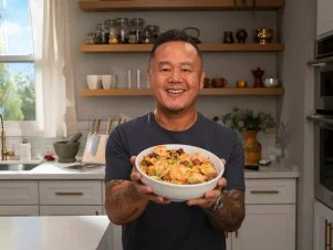 Jet Tila holding House Fried Rice (Yang Chow Fried Rice), as seen on Ready Jet Cook, Season 3.