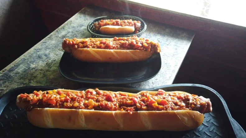 The Spank'n Bacon Hillbilly Harlot Hotdog as Served at Hillbilly Hot Dogs in Lesage, West Virginia as seen on Diners, Drive-Ins and Dives: Take Out, season 32.