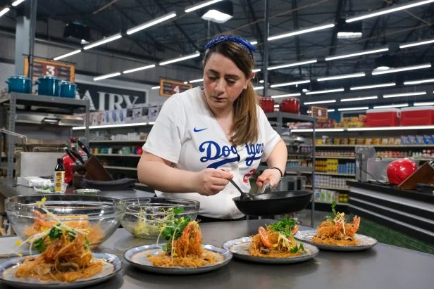 Christine Gerriets at cooking station plating as seen in Guy's Grocery Games Season 37