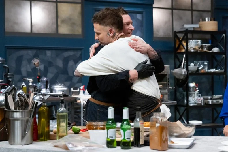 Titan Michael Voltaggio and his brother Chef Bryan Voltaggio at the end of final round, as seen on Bobby’s Triple Threat, Season 4.