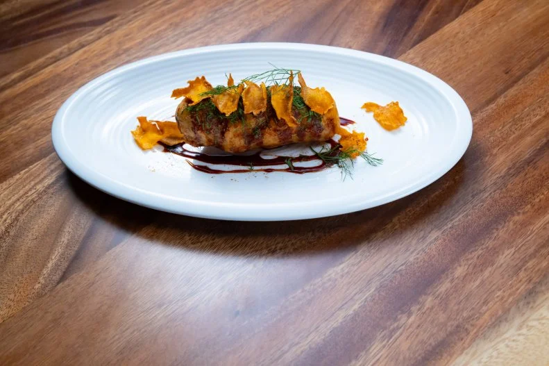 Chef Bryan Voltaggio's final dish with Blue Crab and Paw Paw Vinegar, as seen on Bobby’s Triple Threat, Season 4.