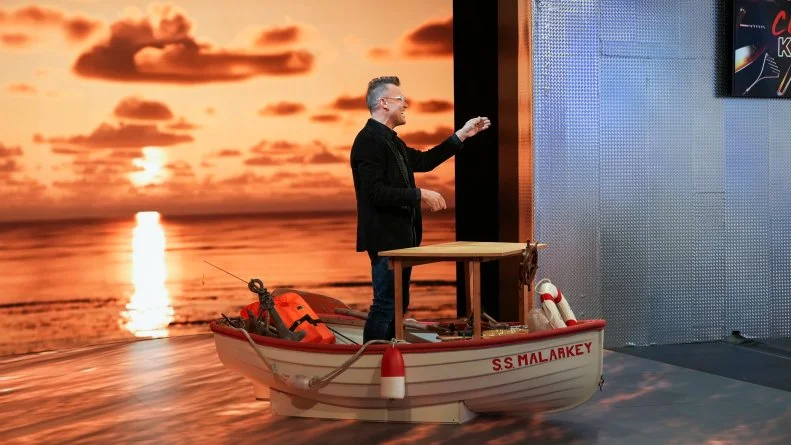 Host Brian Malarkey in a boat, as seen on the Cutthroat Kitchen, season 1.