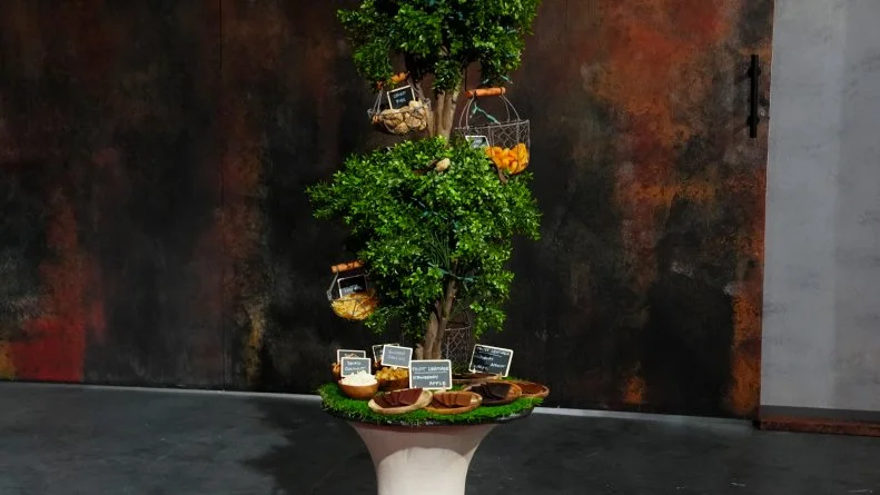 Sabotage auction item - The Queen's Orchard, as seen on Cutthroat Kitchen: Knives Out, Season 1.
