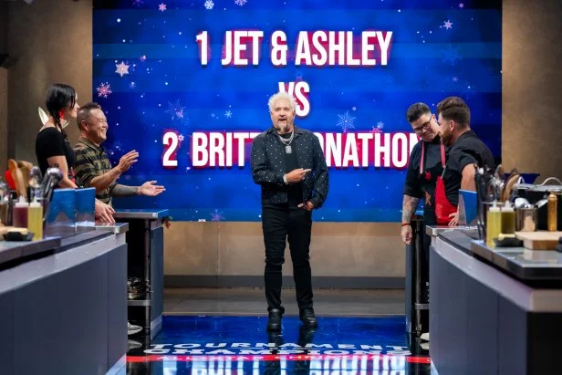 Host Guy Fieri with Contestants Ashley Holt, Jet Tila, Britt Rescigno, and Jonathon Sawyer, as seen on Tournament of Champions Holiday, Season 1.
