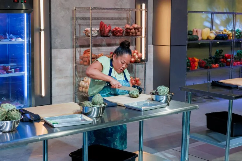 Contestant Lee Anne Wong moves on to the next station, as seen on 24 in 24: Last Chef Standing, Season 3.